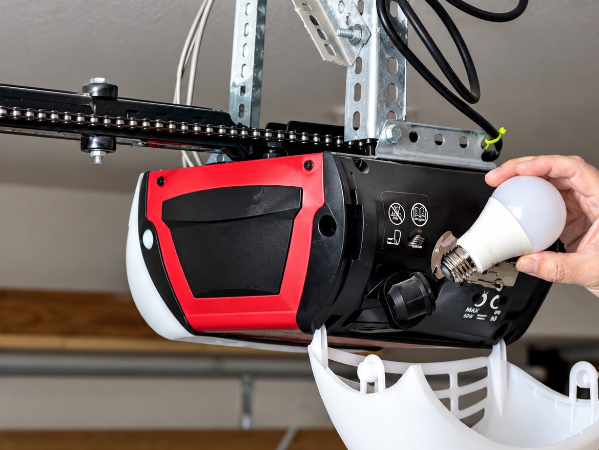 Chain-drive garage door opener with the light cover off
